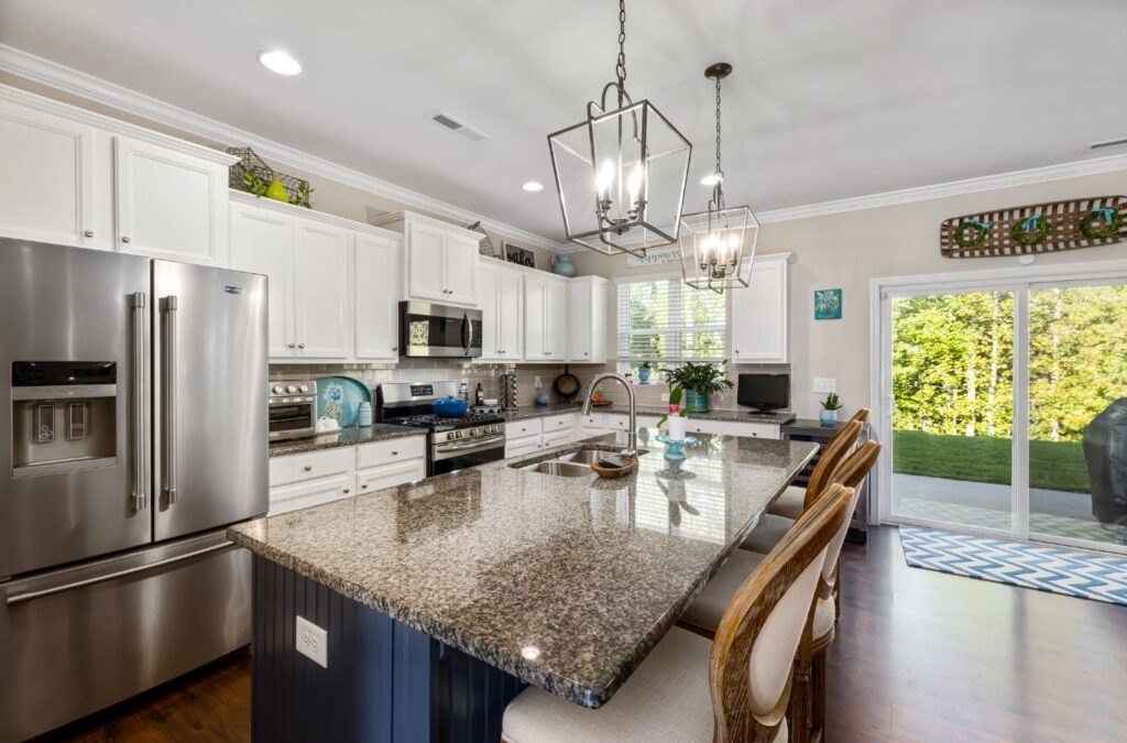 A Swept Up Cleaning expert meticulously cleaning a kitchen in Kyle, TX, showcasing the benefits of a professional touch.