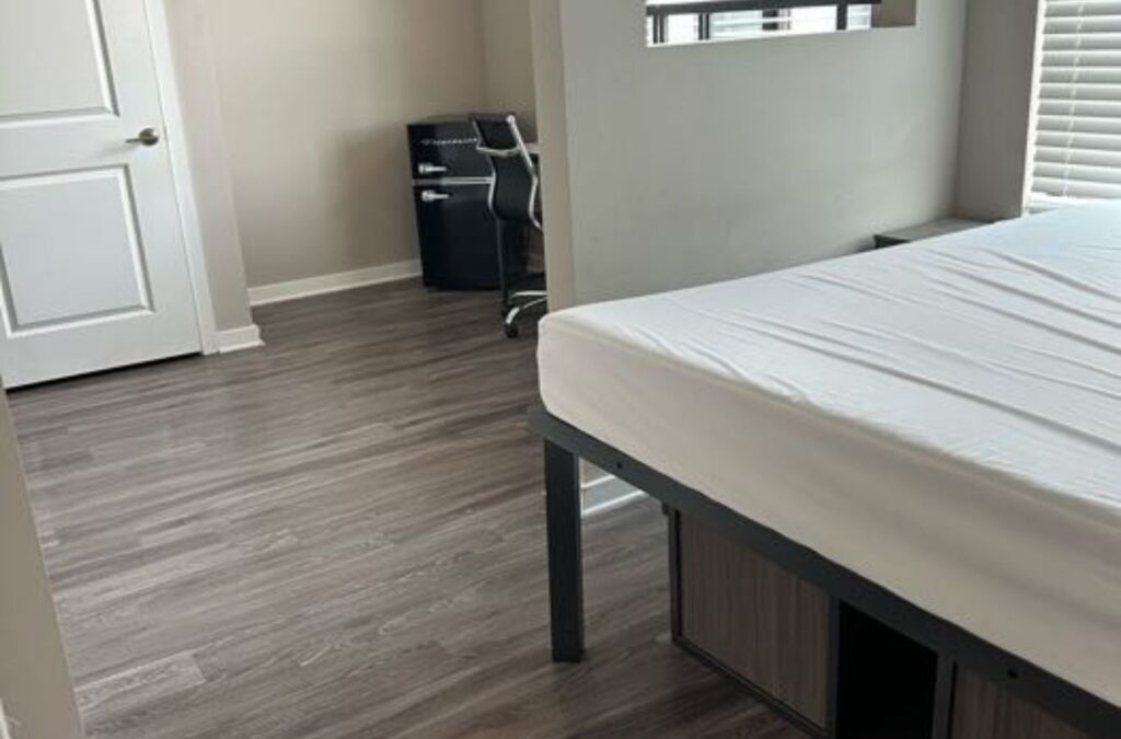 A Swept Up Cleaning Co expert providing cleaning services in Grand Prairie, TX, showing attention to detail and quality client service. Cleaning Services near me.