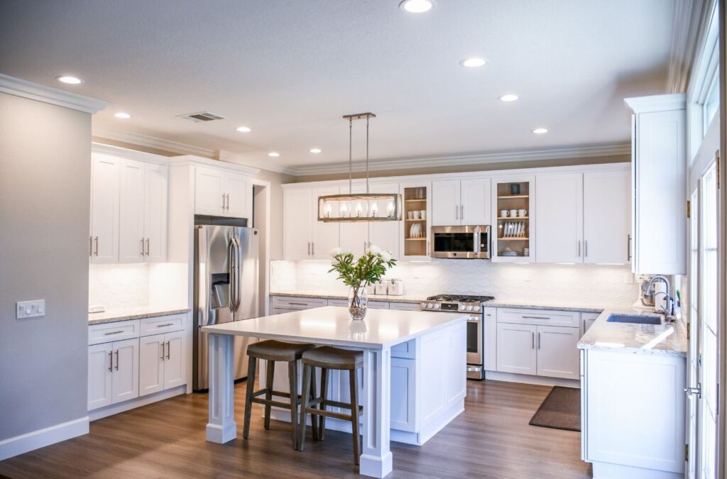 A Swept Up Cleaning Co team member revitalizing a kitchen in Farmers Branch, TX, showcasing why professional kitchen cleaning is essential for a healthy home.