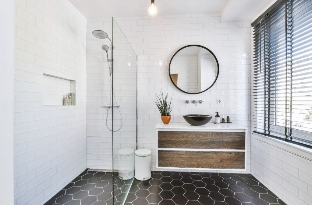 A Swept Up Cleaning Co expert transforming a bathroom in Irving, TX, demonstrating the expertise and dedication to quality cleaning services. Cleaning Services near me.