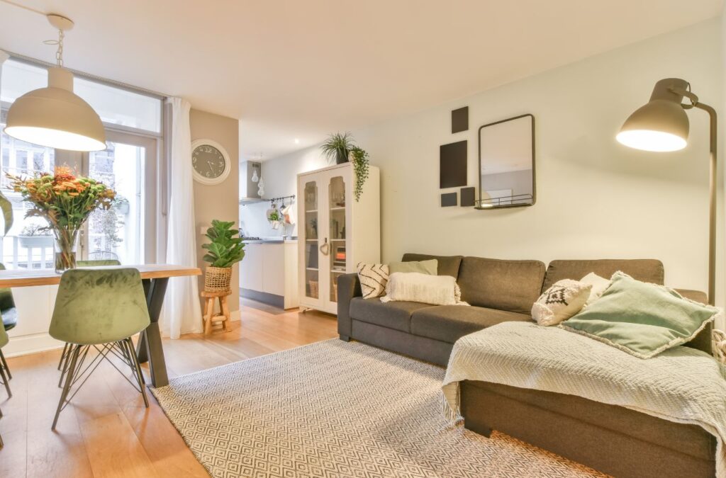 A Swept Up Cleaning Co. expert delivering cleaning services in Addison, TX inside a tidy, welcoming home that reflects spotless results.