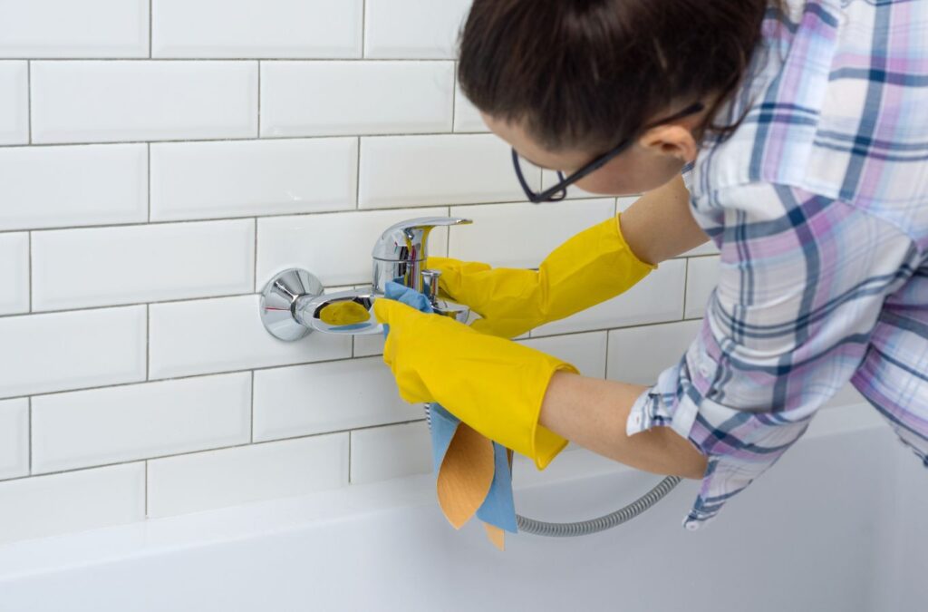 Swept Up Cleaning Co team member vacuuming and sanitising interior surfaces in a Georgetown, TX home to prepare for a new occupant.